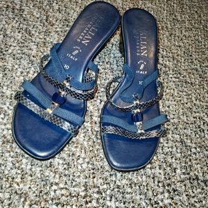 Italian shoemakers slip on heels